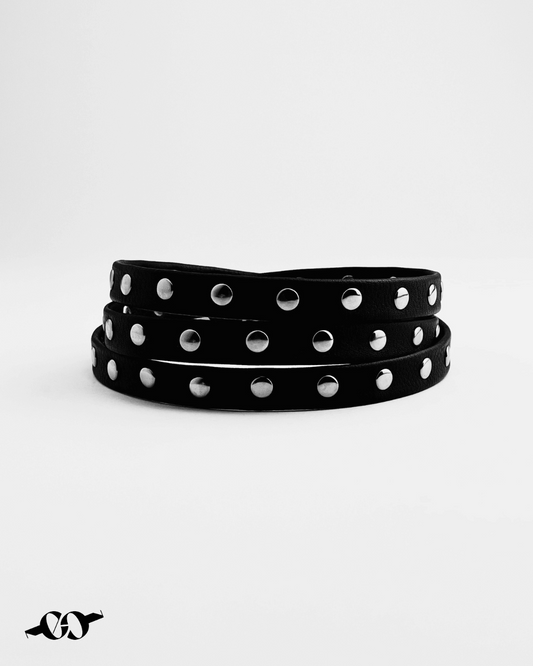 Close up of black choker with silver studs